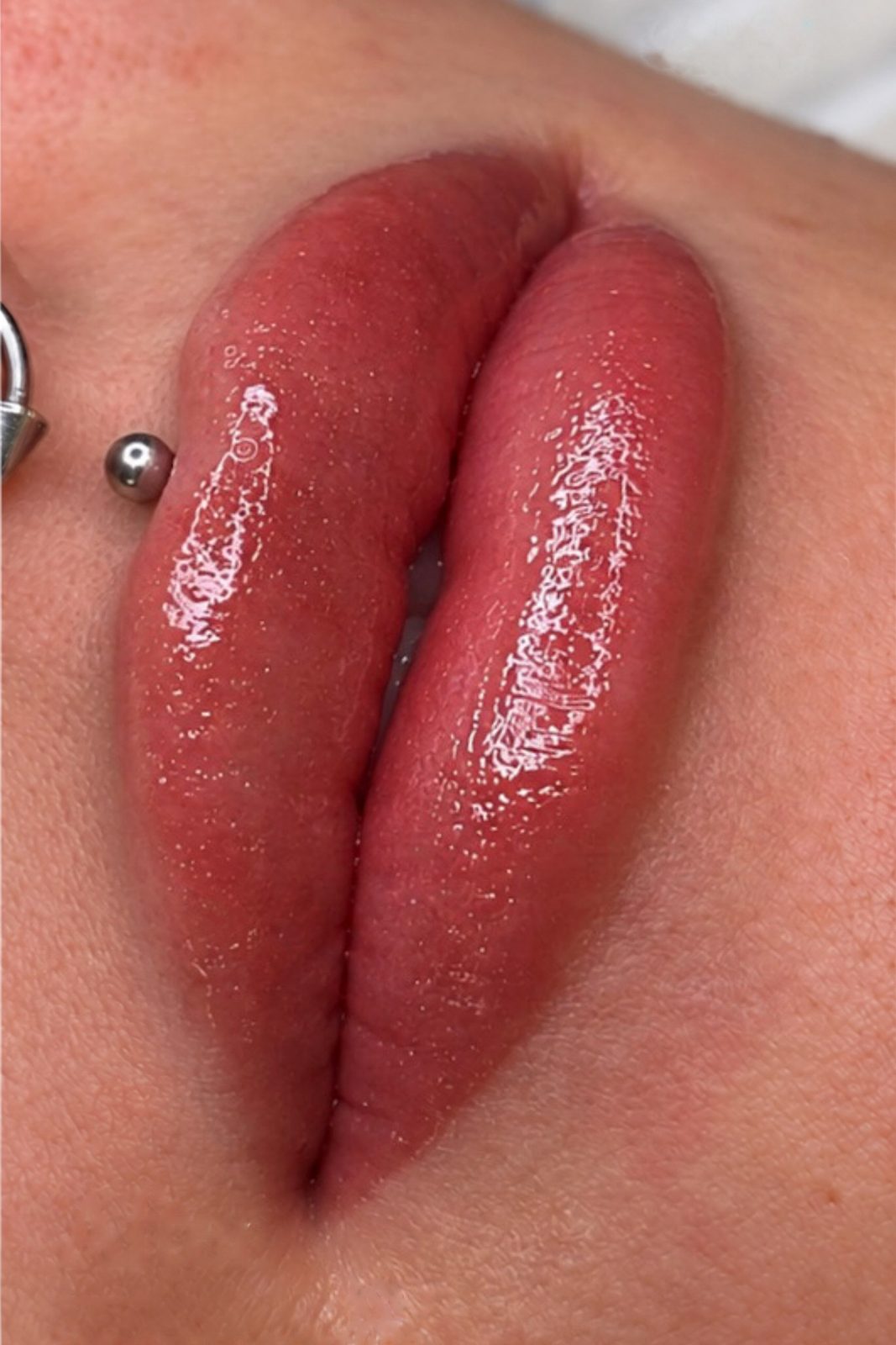 After Russian lip tint, close-up of lips: hydrated look with even natural pink colour