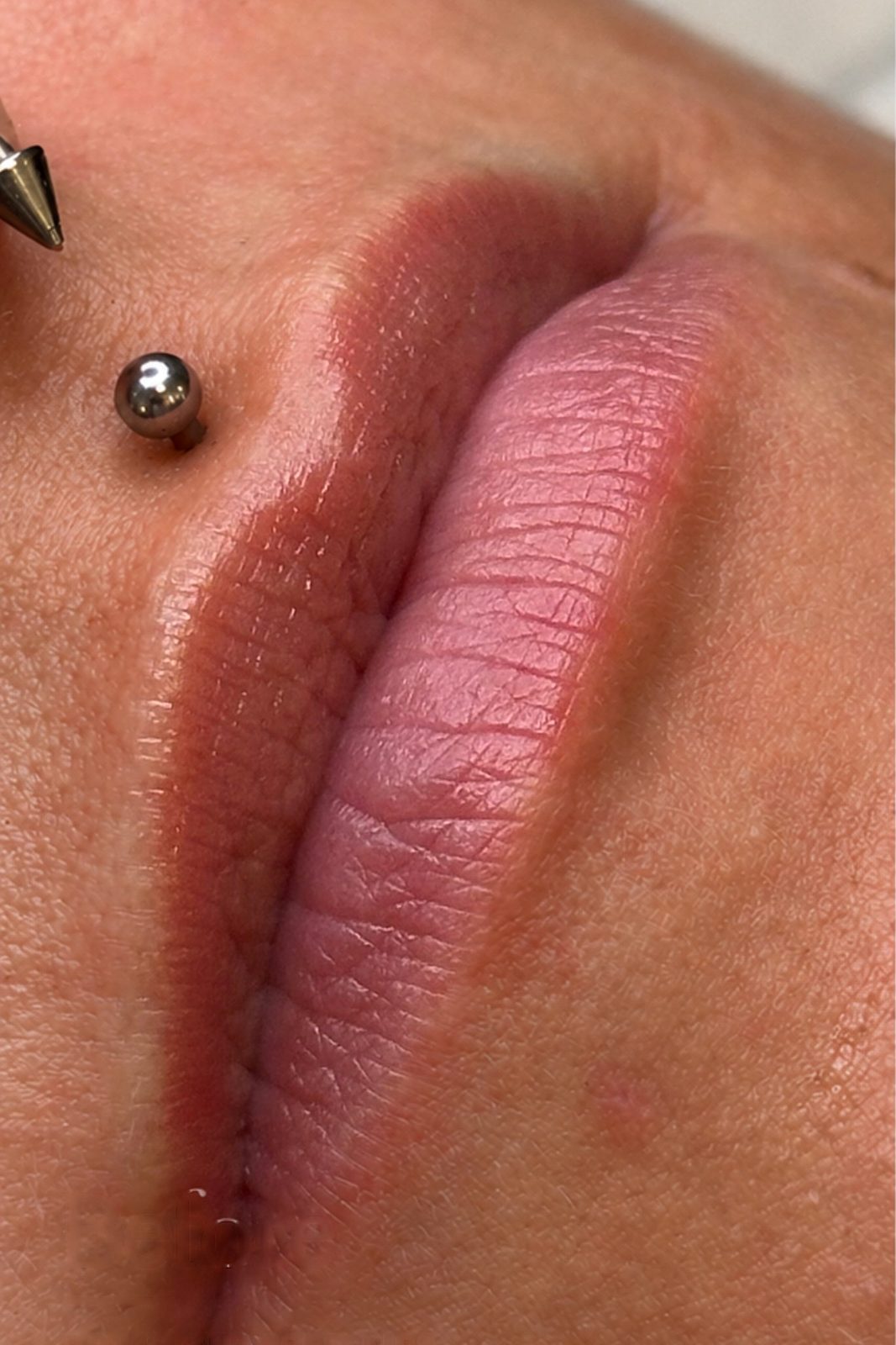 Before Russian lip tint, close-up of lips: dry texture and darker, uneven tone